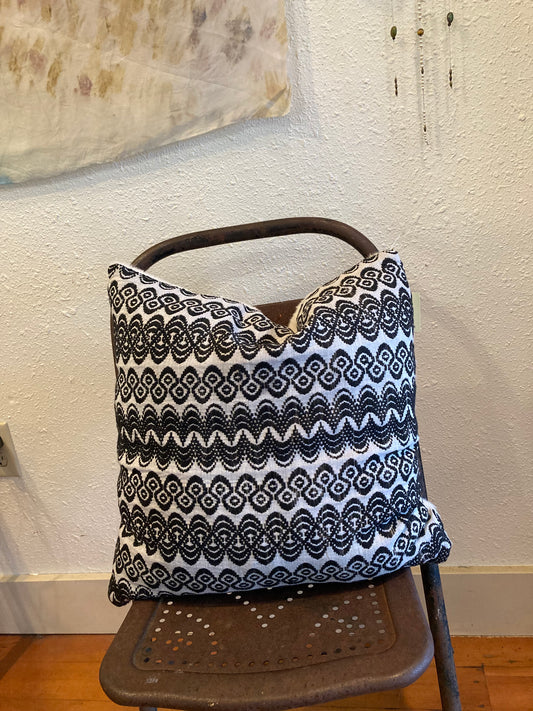 Pillows - white faux fur and woven Indonesian fabric